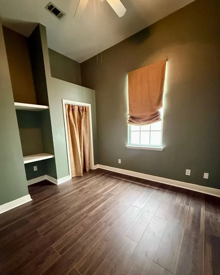 green walls open space linen curtains orange curtains white trim on green walls open concept office space office rental commercial office rental space  