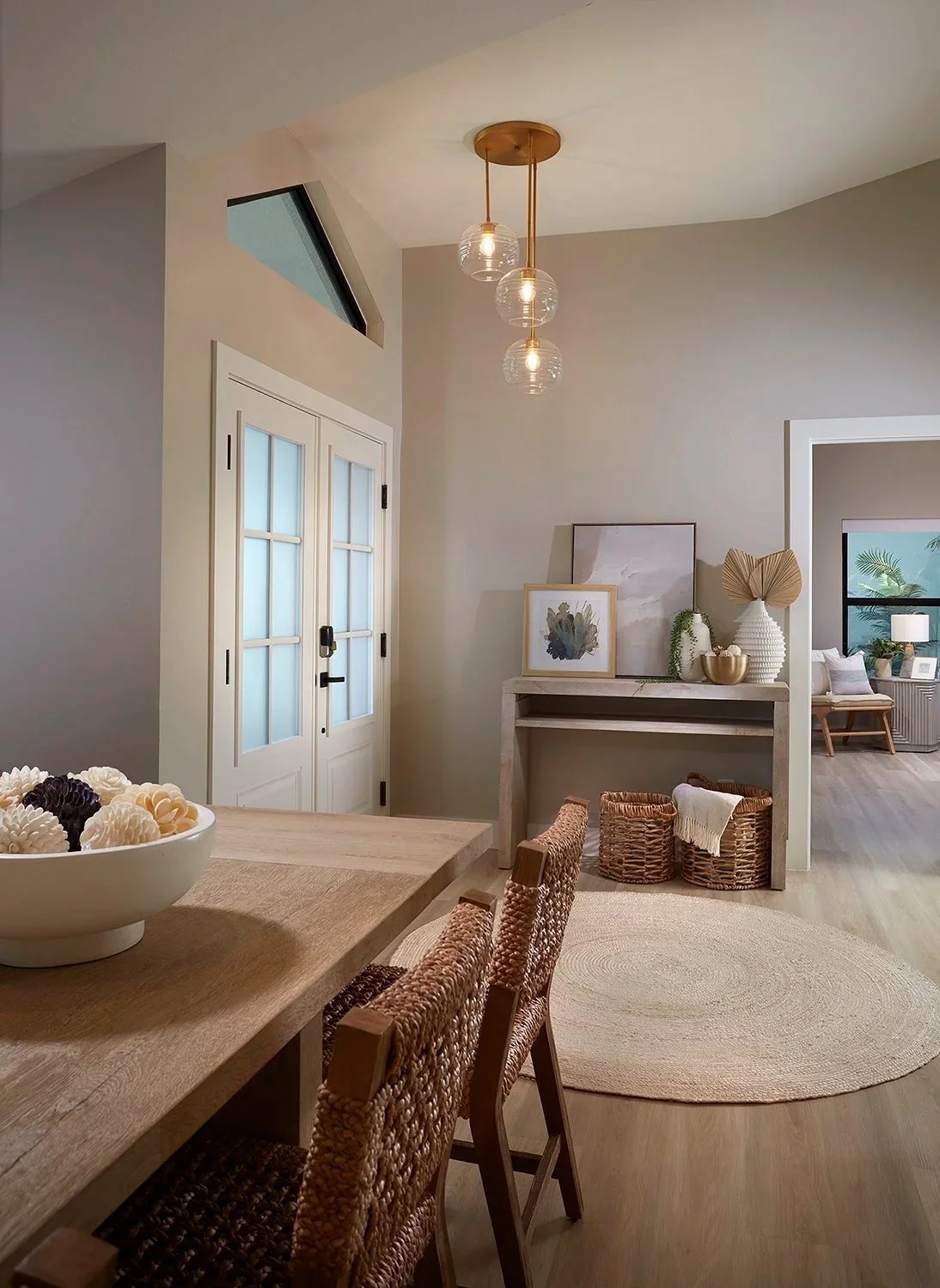 Luxury white kitchen renovation featuring custom cabinetry, marble surfaces, and warm wood accents in Great Hills, Austin, Texas by Anna Gray Designs