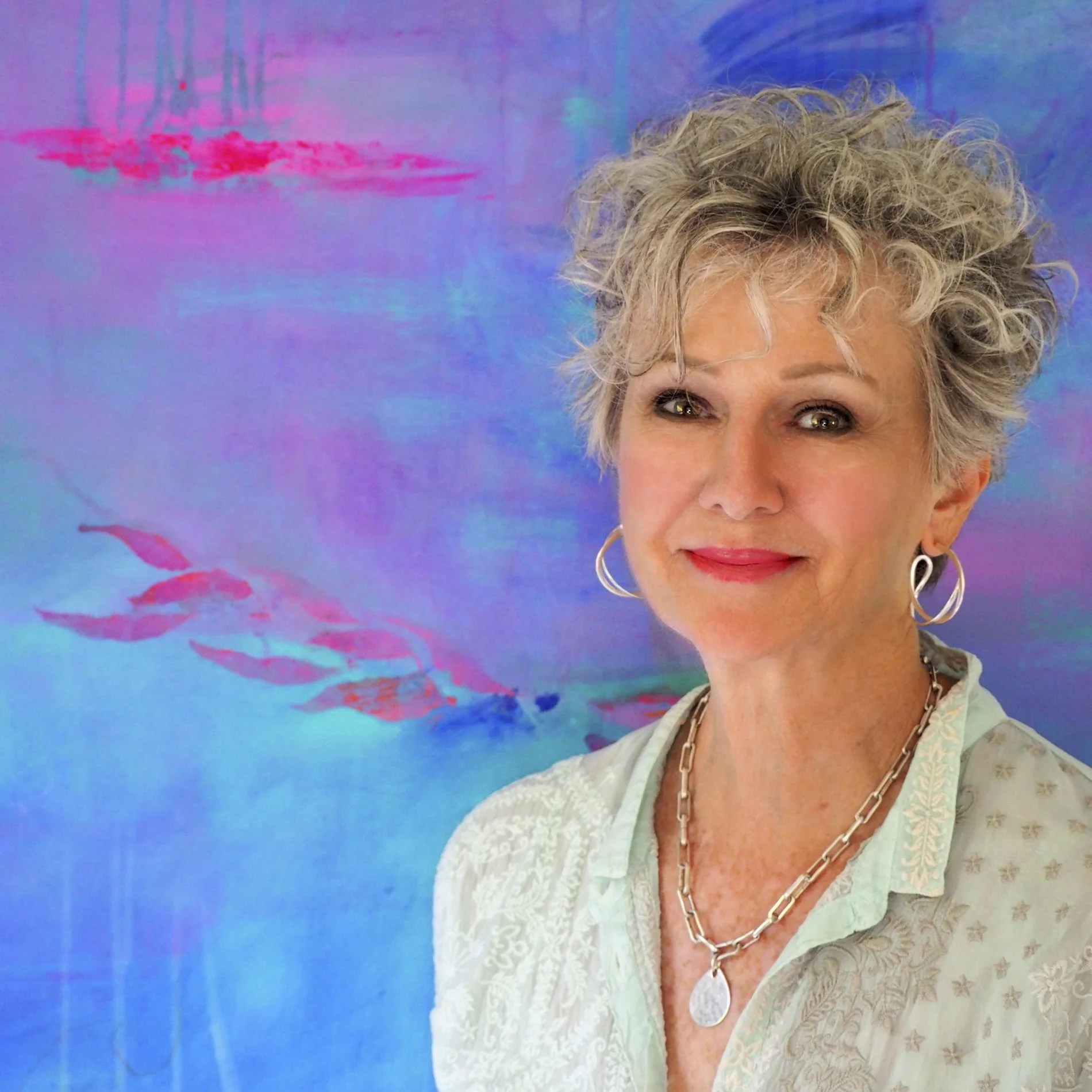 Portrait of contemporary Australian artist Anne Whately in her studio.