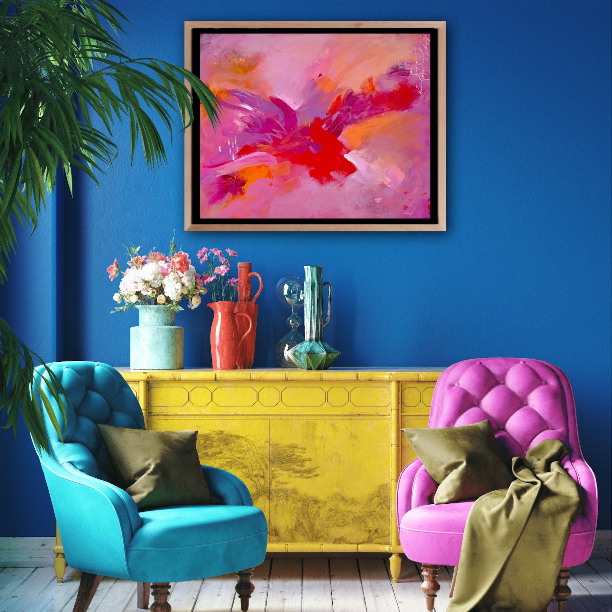 Contemporary abstract artwork in pink and orange tones displayed in a modern interior setting