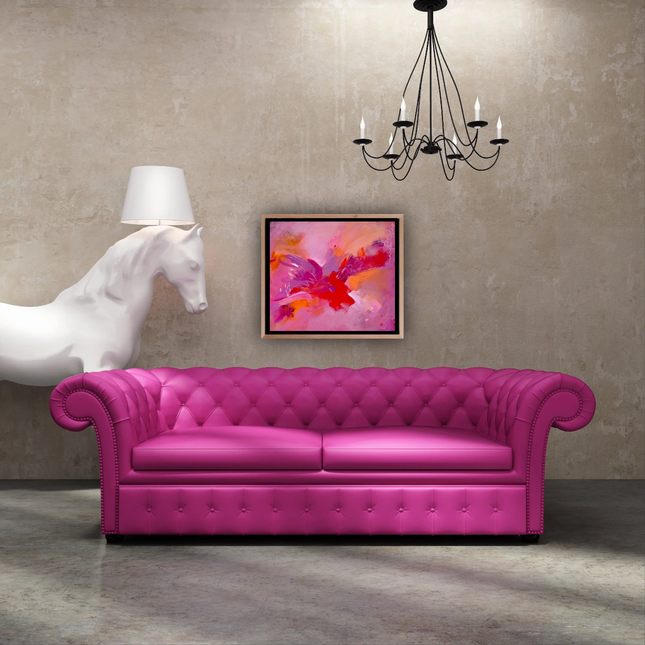 Colourful abstract painting on wall above a pink sofa