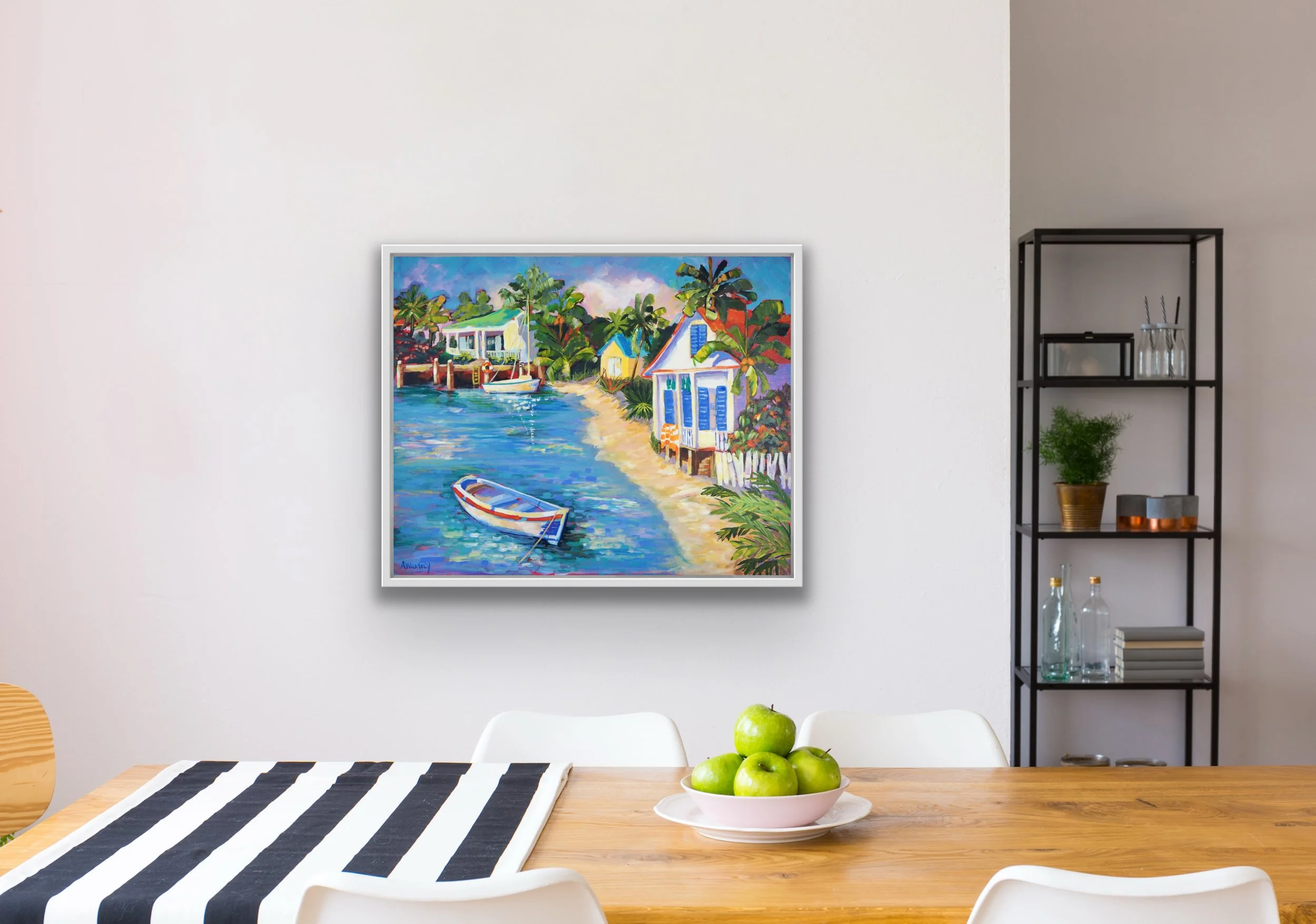 Blue Shutters, Bahamas original artwork hanging on neutral wall above dining table with striped runner and bowl of green apples.t