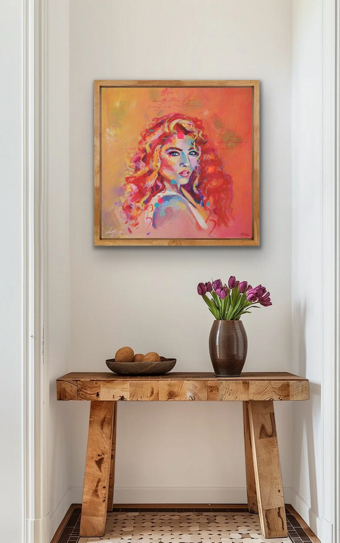 woman portrait painting on neutral wall above bench.