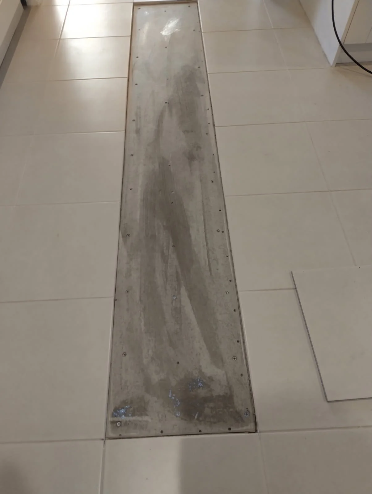 how to replace discontinued tiles after iplex pipe repairs.