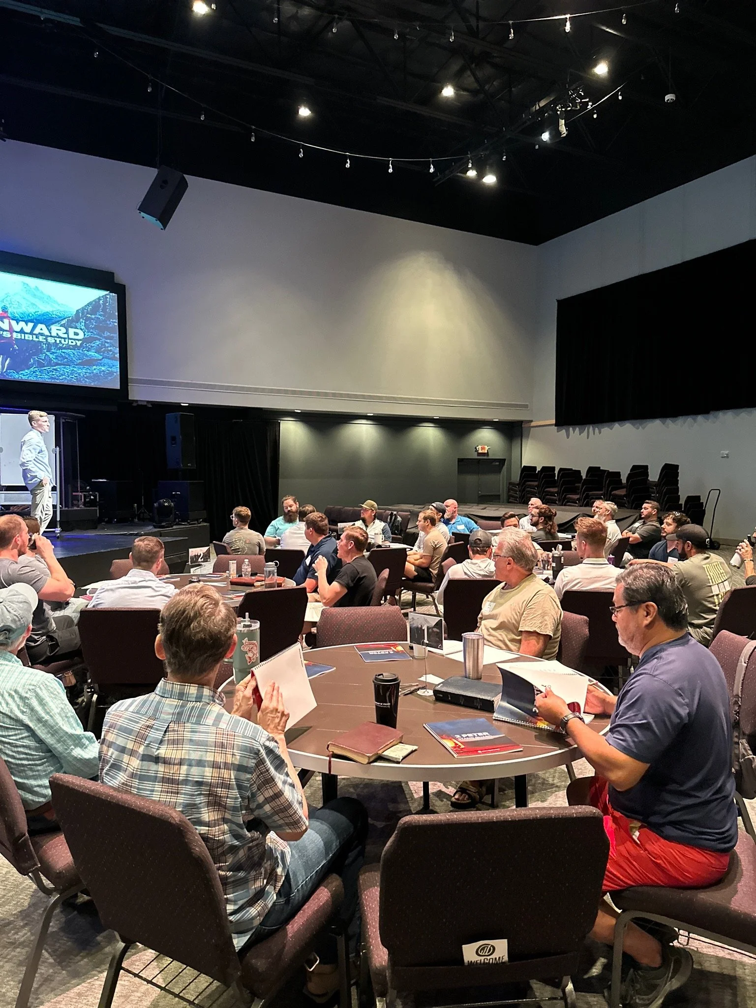 Men studying Gods word at Onward Commuity Church