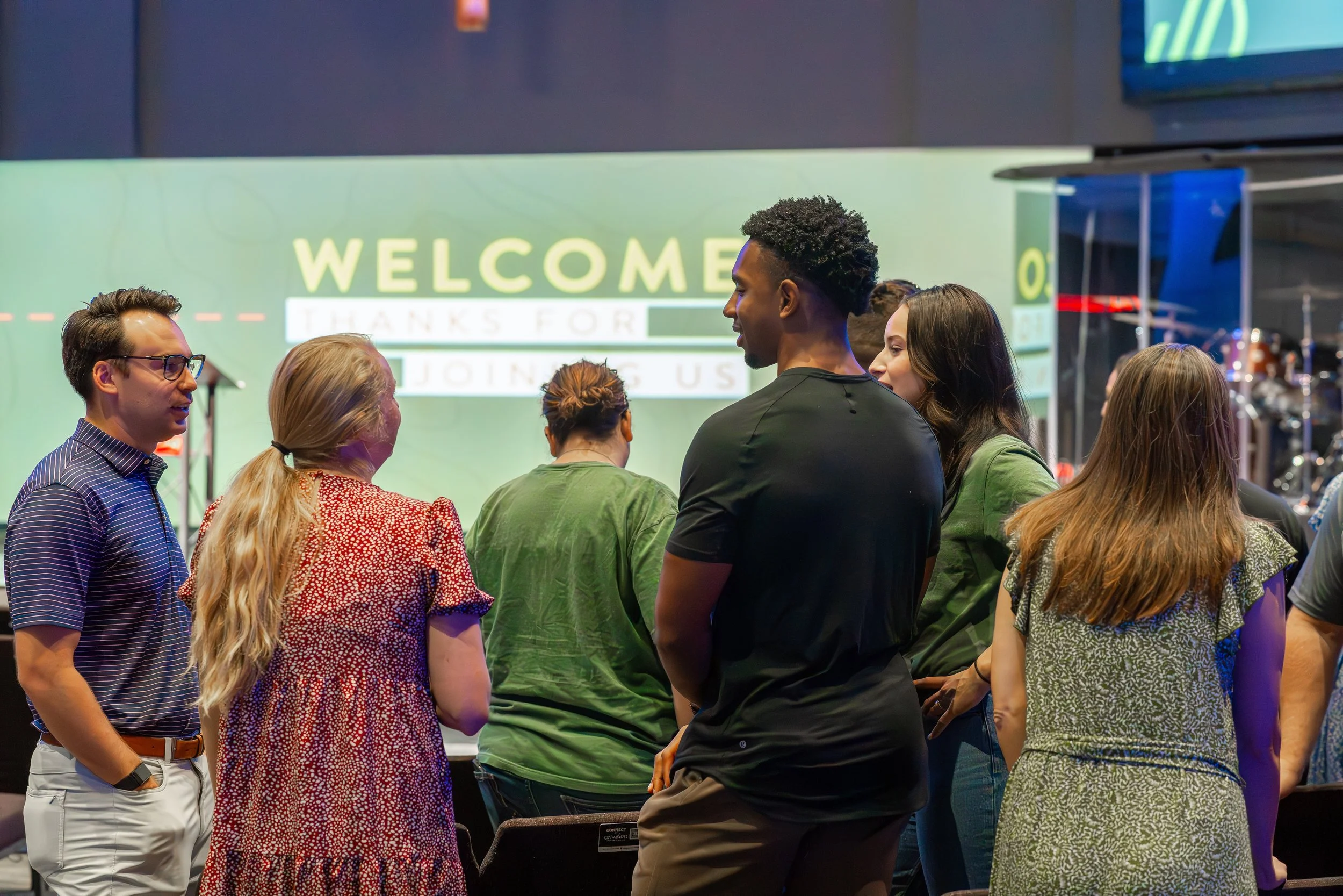 two couples talking and gtting to know each other at Onward Community Church Frisco