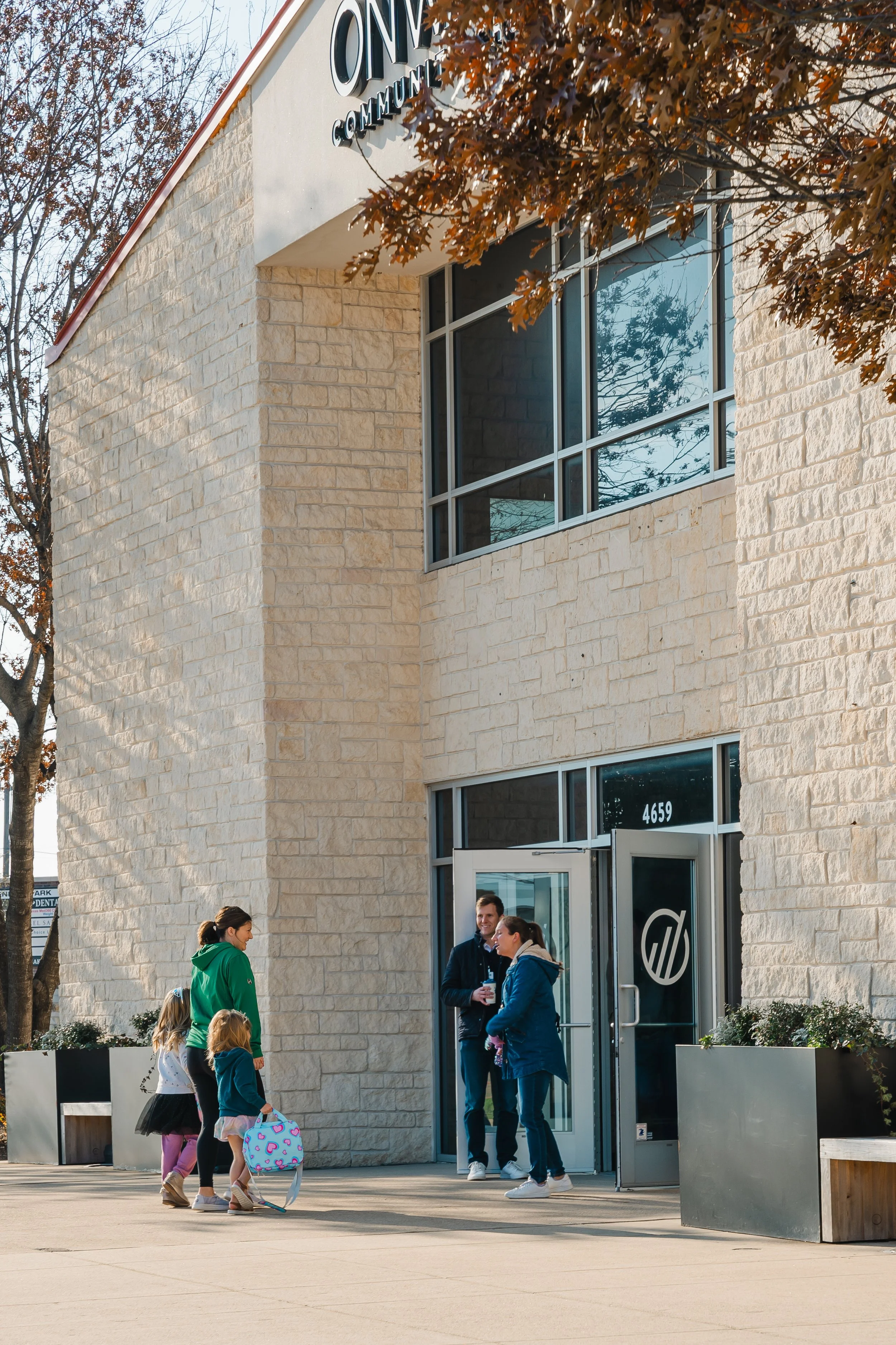 Family being welcomed at Onward Community Church in Frisco