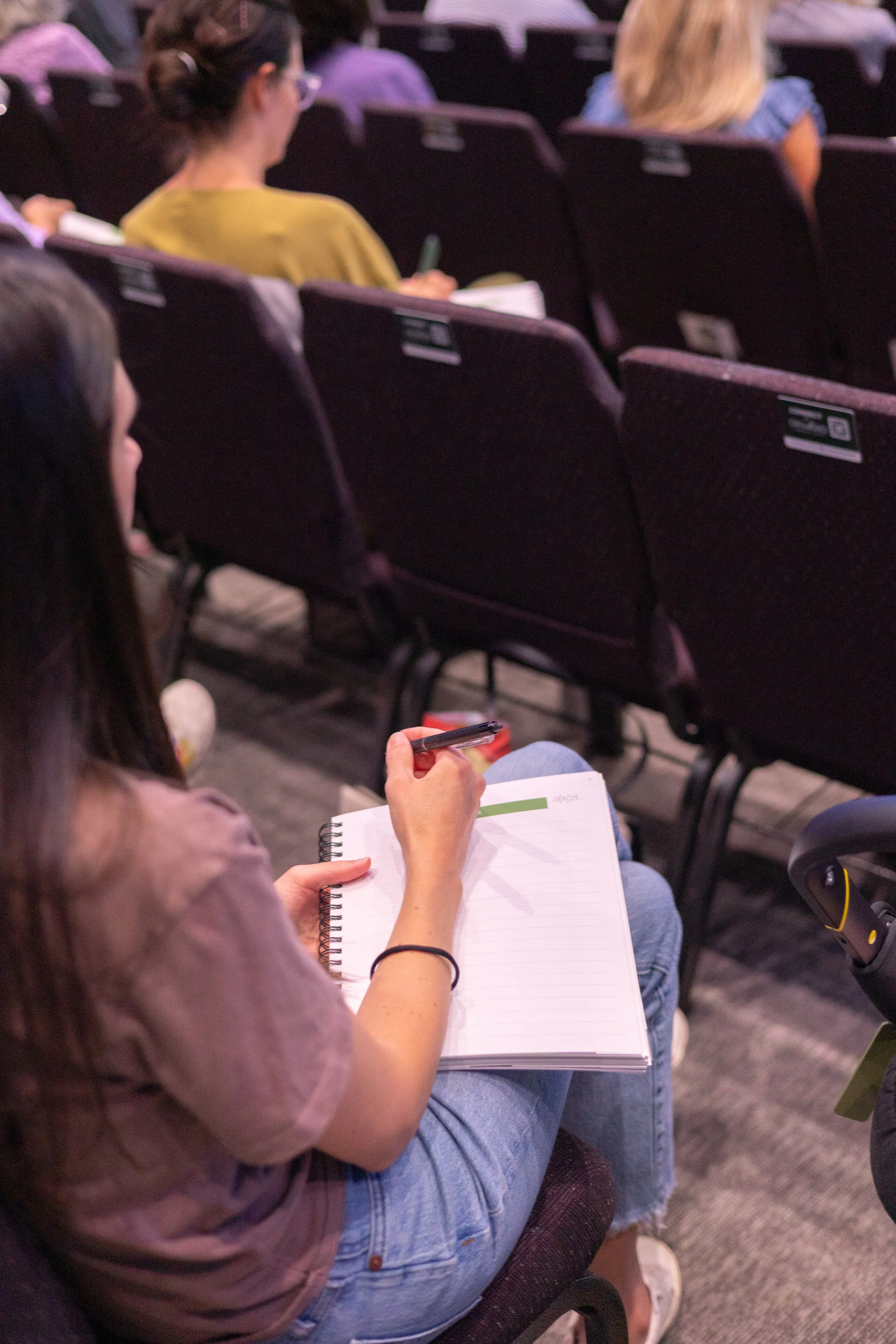 Woman learning about God's word at onward community chuch in frisco