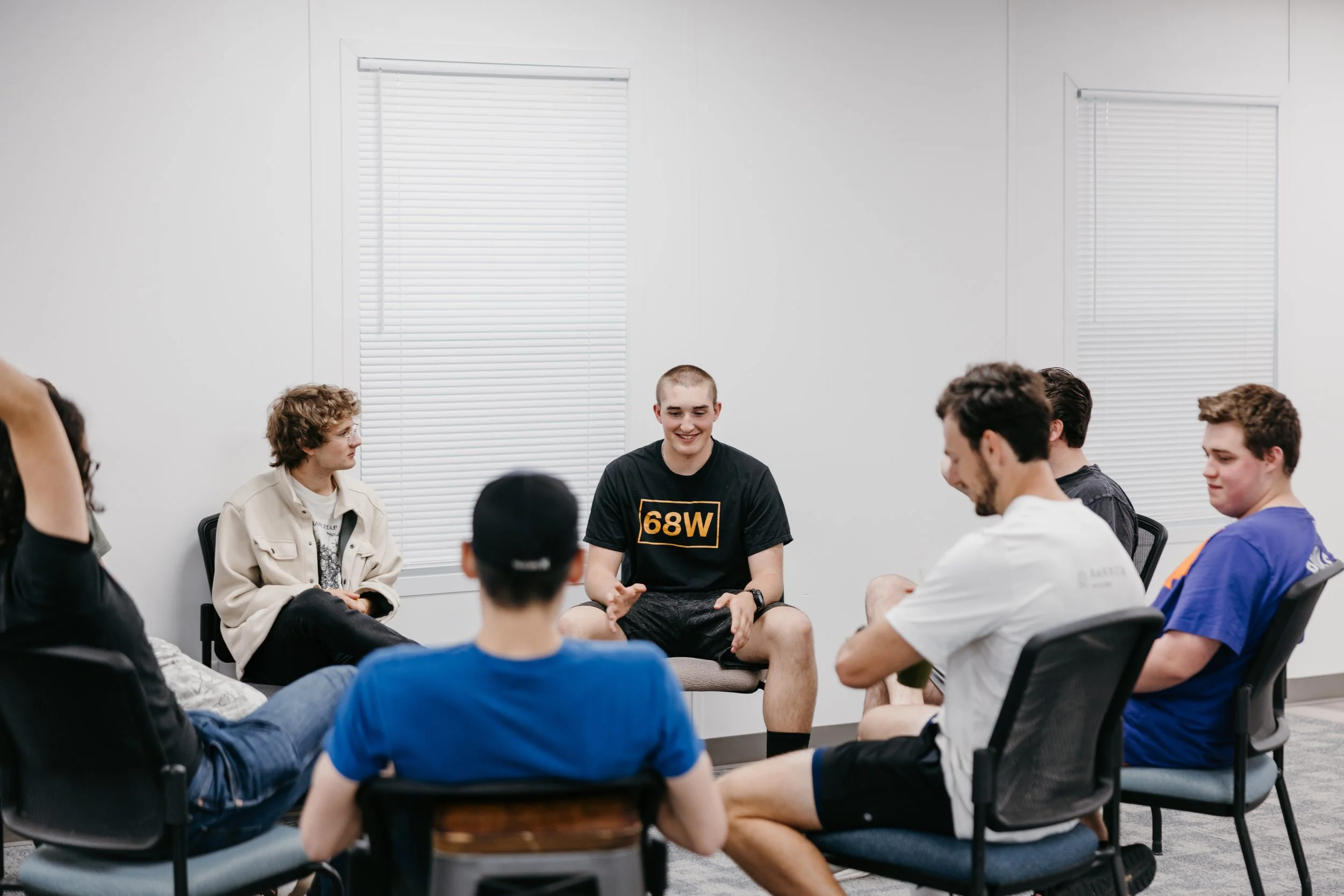 Students in small group talking through life together at onward community church in frisco