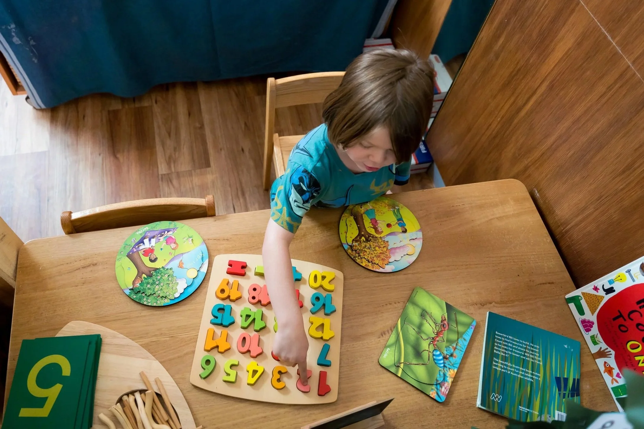 Kindergarten child participating in play-based learning activities at PLAY Childcare & Kinder