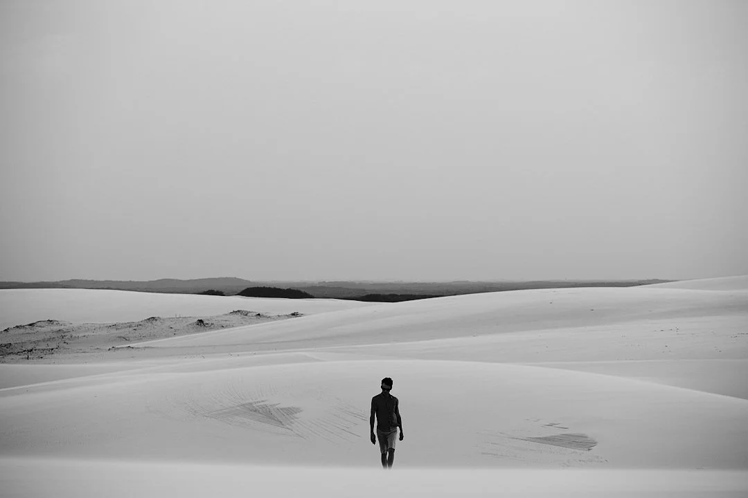 The dunes of Lençóis Maranhenses rise and fall like something the ocean left behind and forgot to take back. They stretch for miles in every direction, white and silent, interrupted only by the lagoons that form between them when the rains come. On t
