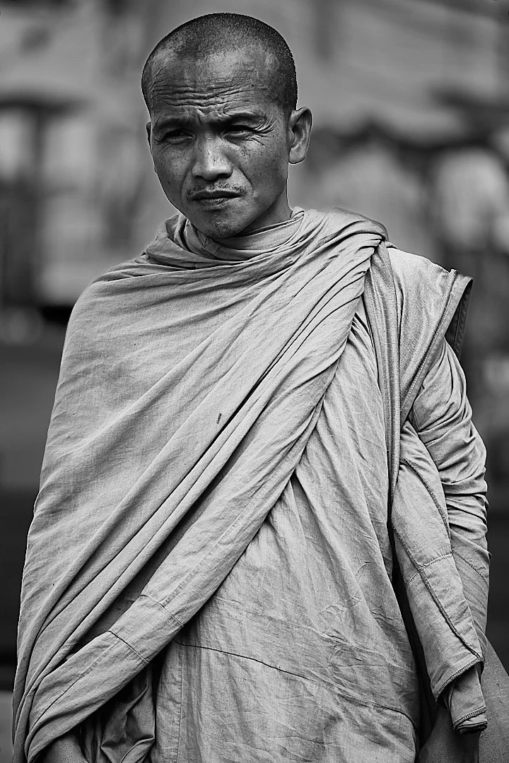 He looked at the camera the way people look at something they have already considered and decided about. Steady, unhurried, entirely himself.