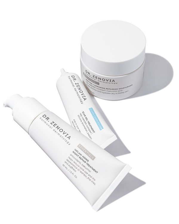 Set of Dr. Zenovia skincare products including a jar and two tubes on a white background with shadows.