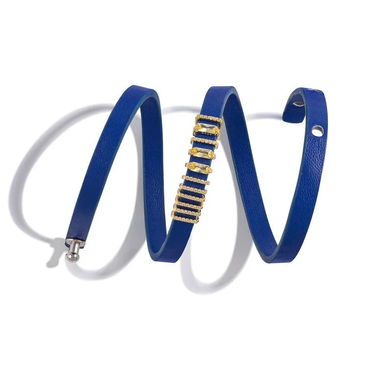 Blue leather wrap belt with gold and diamond buckle