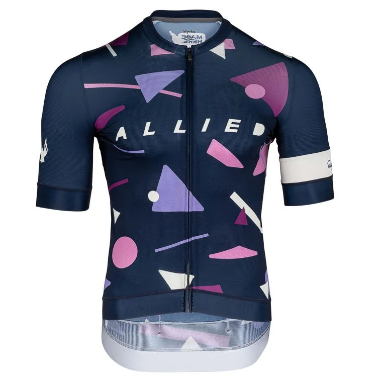 A dark blue cycling jersey with a colorful abstract pattern in pink, purple, and white. It has a front zipper and the word "ALLIED" written across the chest.
