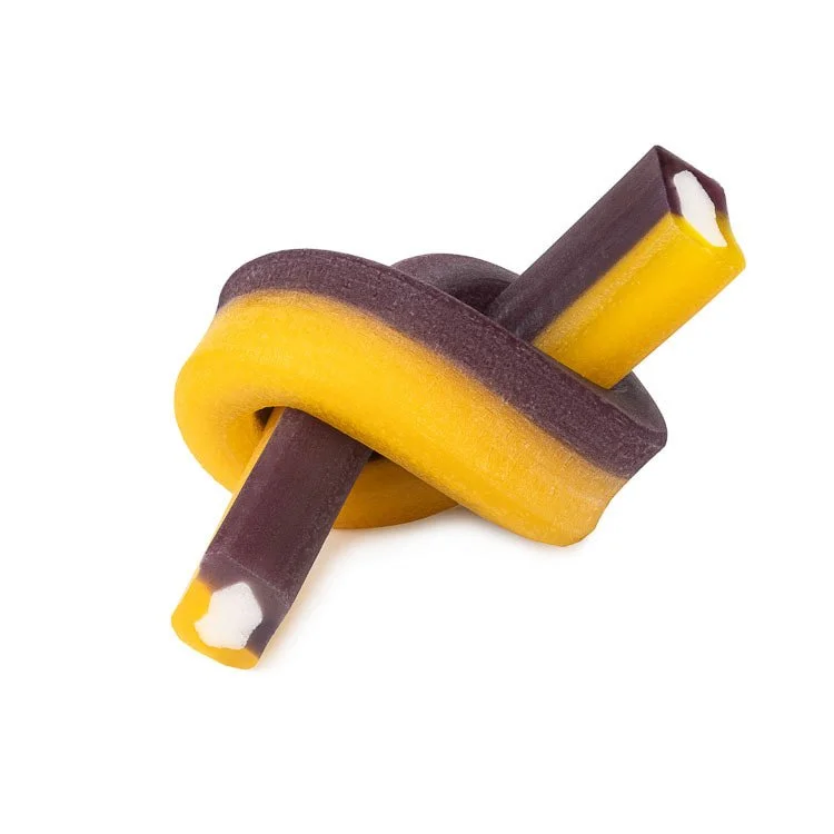 Two twisted licorice candies, one yellow and purple, with white centers, intertwined against a white background.