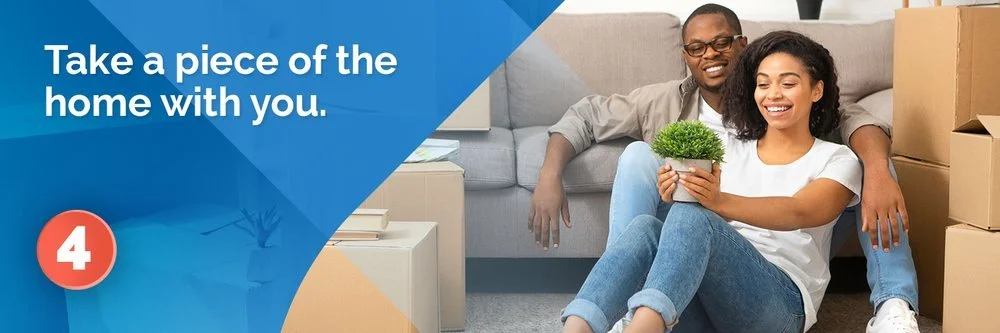 Tip 4: Take a piece of the home with you. A couple holds a potted plant while sitting among moving boxes.