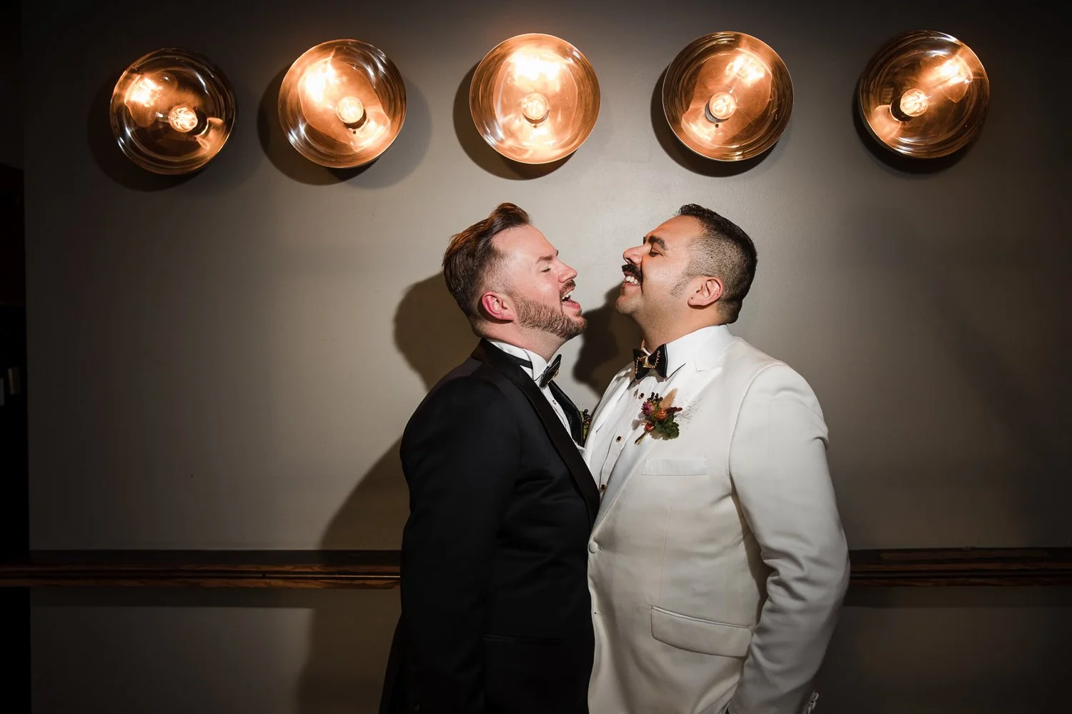LGBTQ couple candidly laughing, venue is Terminus 330 in Downtown Atlanta