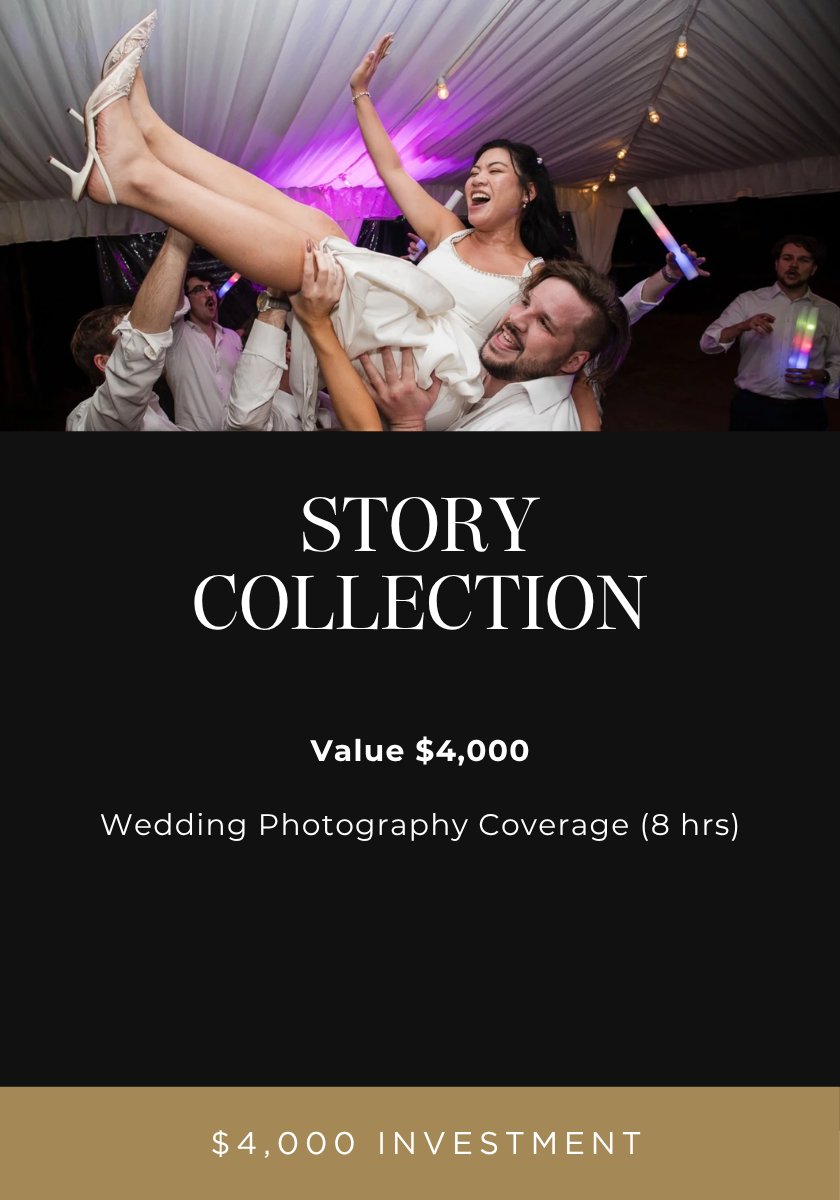 People celebrating at a wedding reception, with a man lifting a smiling woman in a white dress and high heels, under a decorated tent with string lights.
