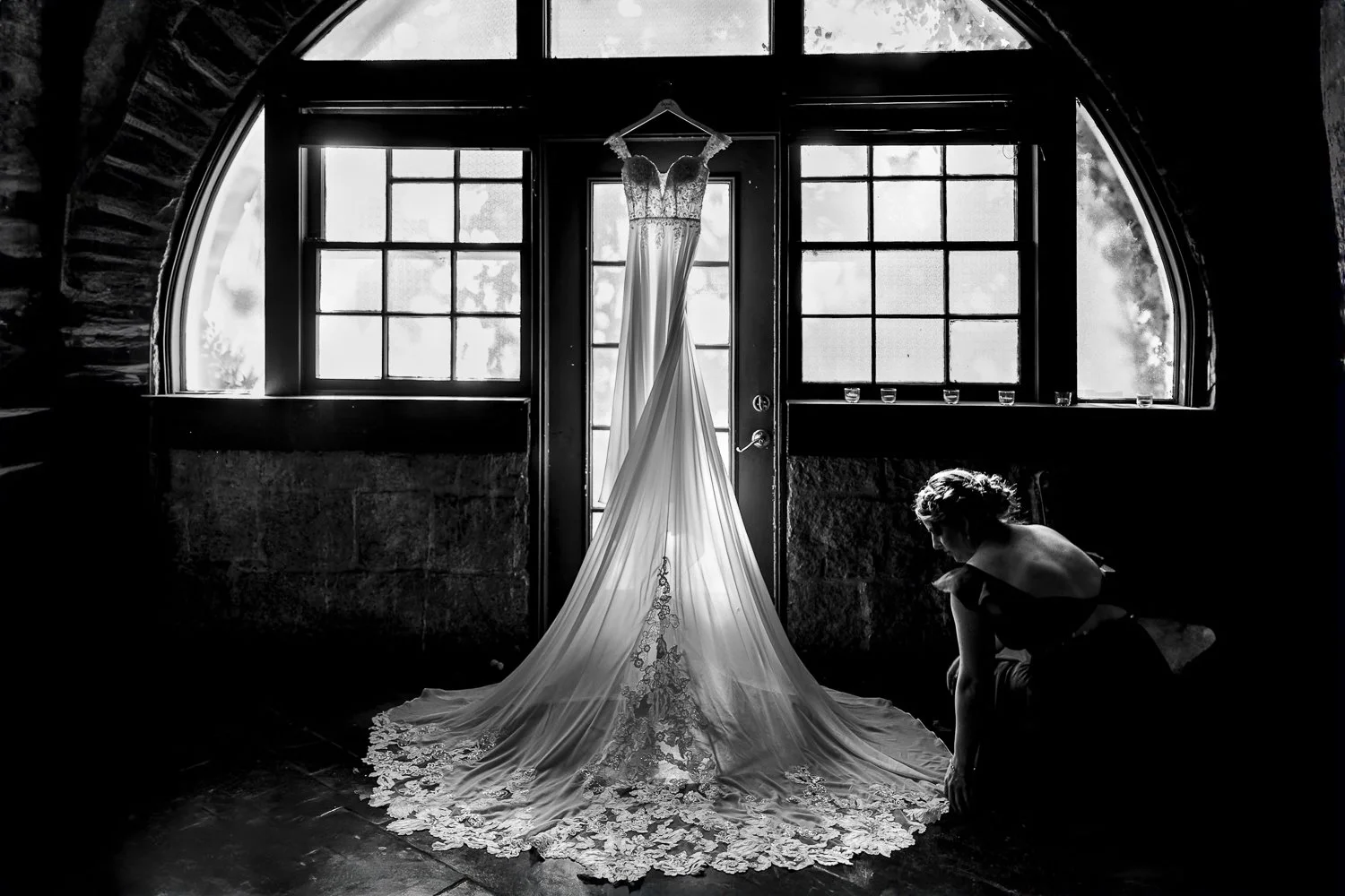 Piedmont Tent Wedding, Dress haging in the arched window inside the Bridal getting ready room