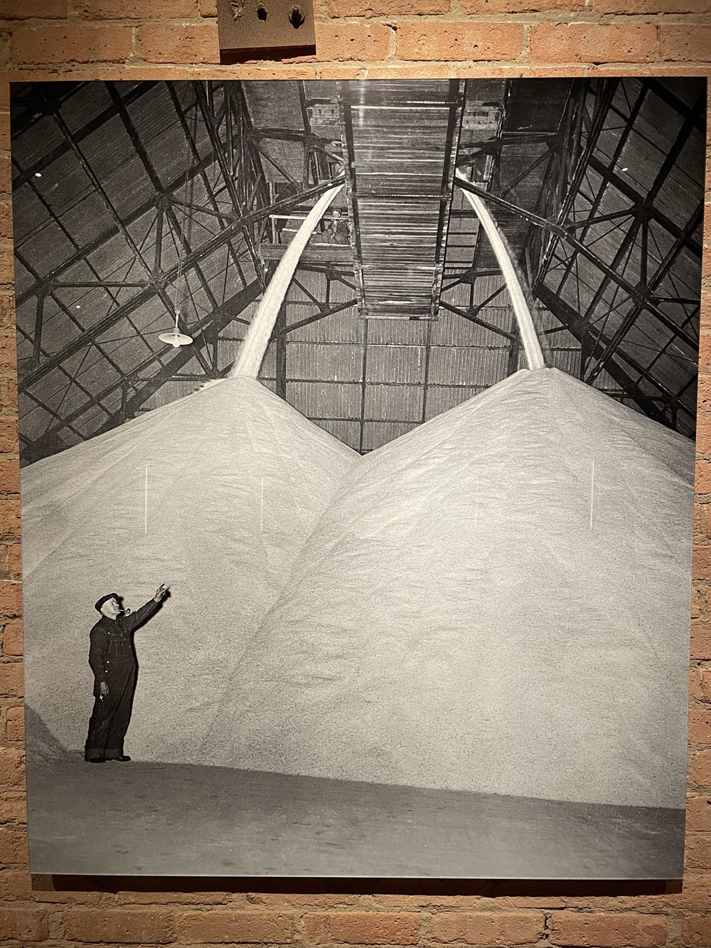 &lt;em&gt;Archival images on display at the Shed: Salt diverted off the conveyer belt in the roof monitor, poured into piles on the floor of the shed, August 1946&lt;/em&gt;