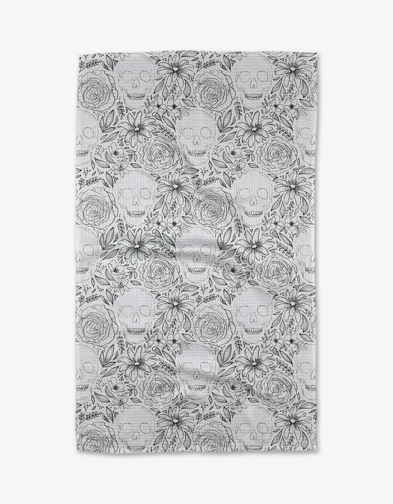 Geometry House tea towel with skulls and flower illustrations