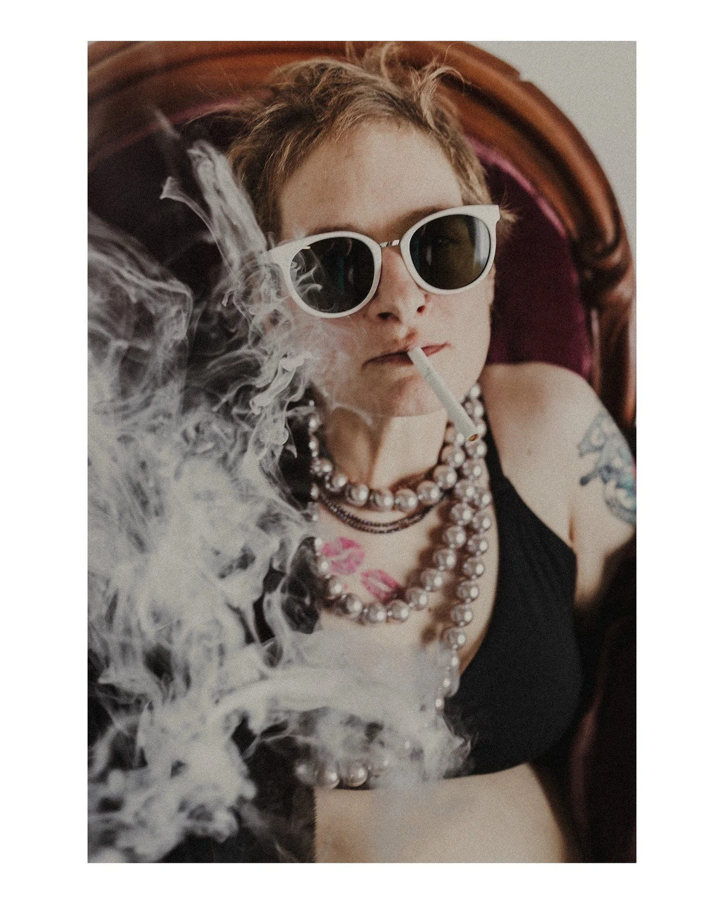 Wendy's badass vibe here is *chef's kiss* 😍 Be so entirely yourself that it inspires others to do the same. ❤️
.
.
.
.
.
.
[Image Description: A white person with short light brown hair, white vintage-style sunglasses, large pearl necklaces, and a b