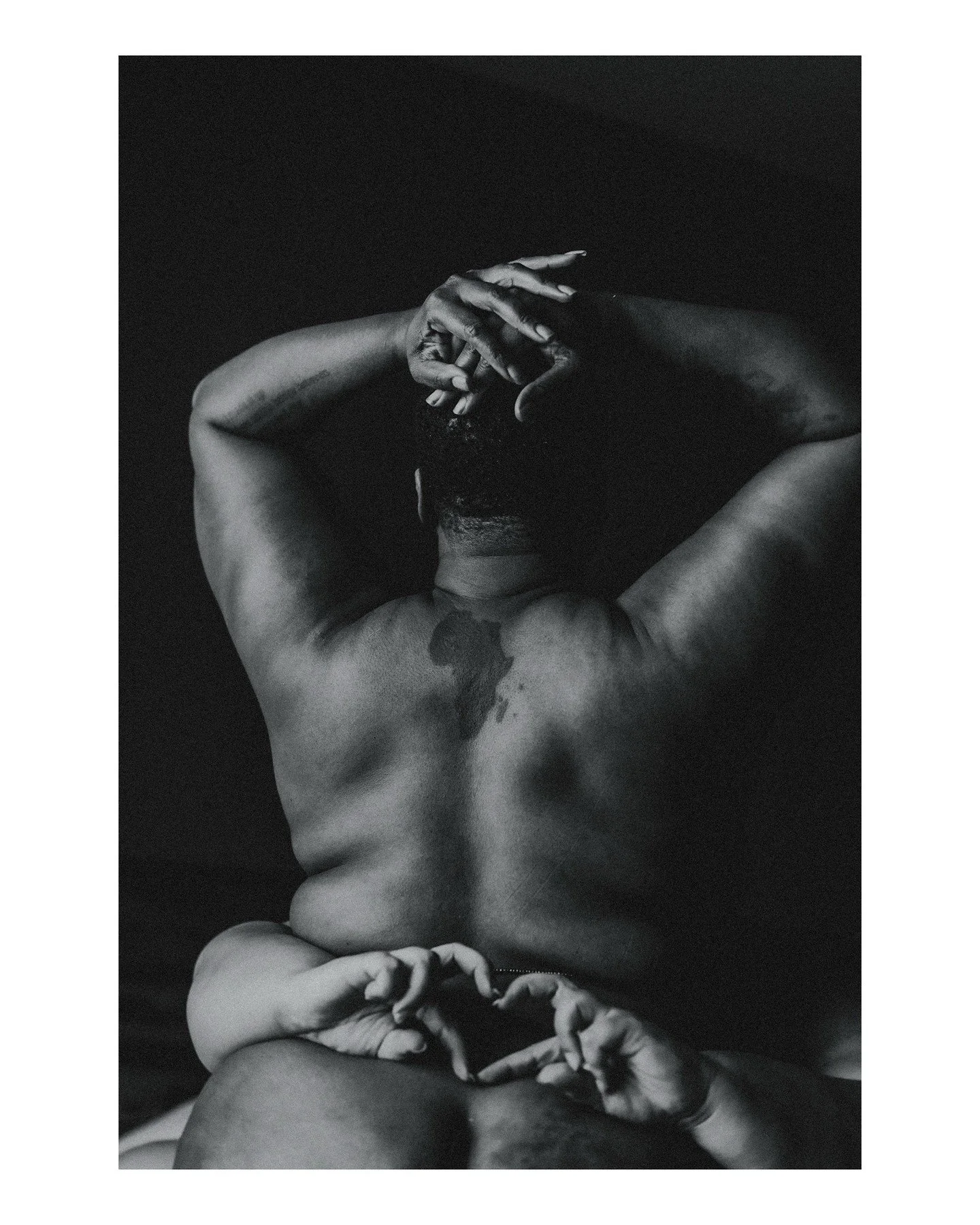 This might be one of my favorite photos I've ever taken! Sami + Eris were stunnnnnnnning in their couples boudoir session 😍
.
.
.
.
.
.
[Image Description: A black &amp; white image of a Black non-binary person with short-cropped hair, naked but fac