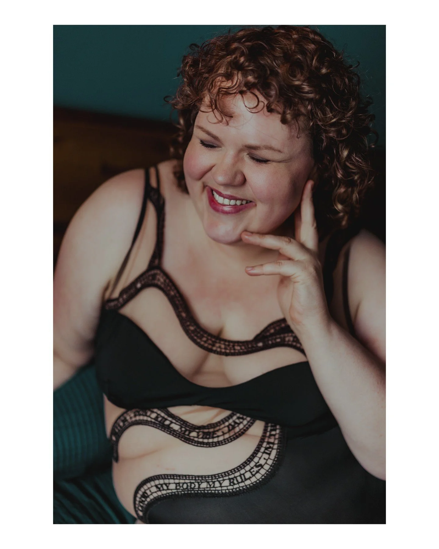Your body, your rules, friend. 😍
.
.
.
.
.
.
 - Camera Gear: 
 - Canon: @canonusa
[Image Description: A white person with short curly reddish brown hair is sitting on a bed laughing as they lean into one hand. They are wearing a black mesh bodysuit 