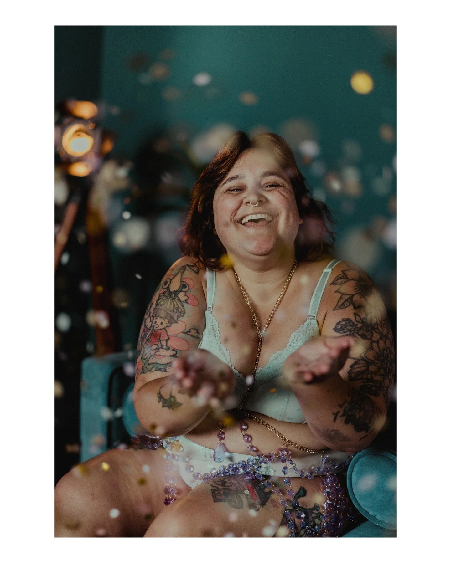 To all my trans friends, your joy is f*cking BEAUTIFUL, and never forget it! 🏳️&zwj;⚧️💜
.
.
.
.
.
[Image Description: A non-binary person with an olive skin tone is laughing joyously while throwing confetti in the air. They are wearing a mint lace 
