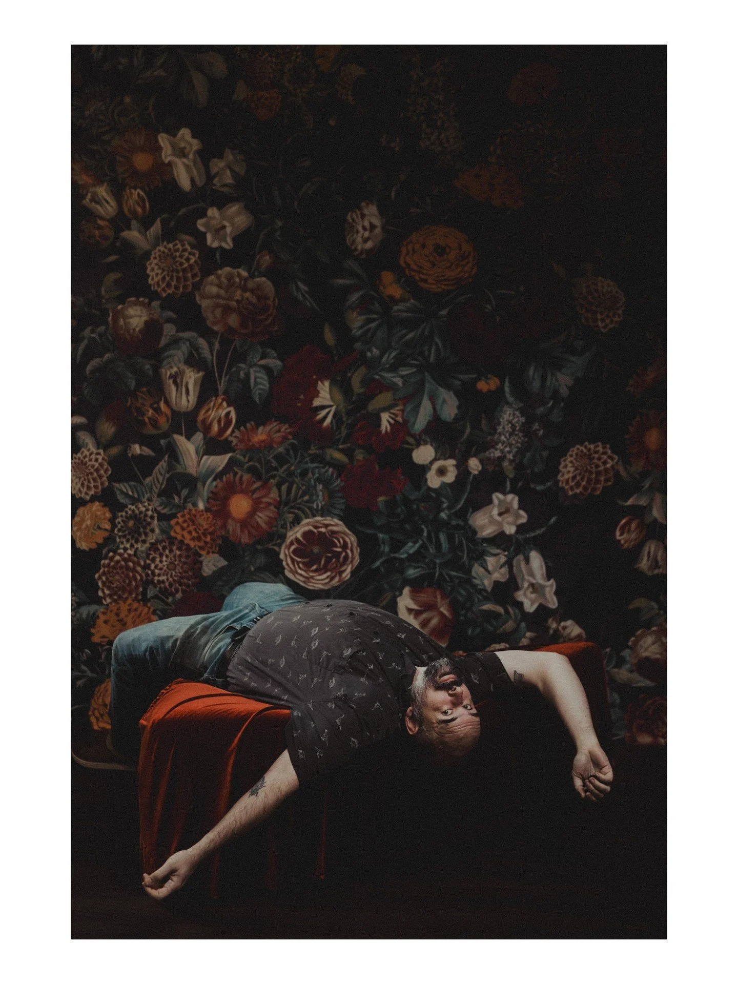 Did you miss this floral backdrop, cuz I did! Enjoy this picture of Rob of @robandsamphoto helping me out with a lighting test before some amazing roller derby photos! 
.
.
.
.
.
[Image Description: A white man with a shaved head and black &amp; grey
