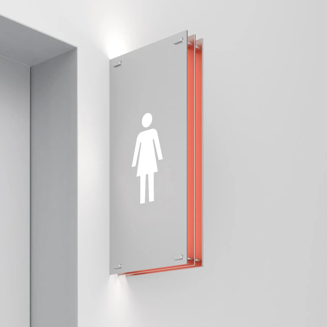 Modern women’s restroom sign on a white wall, with a digital red-orange outline