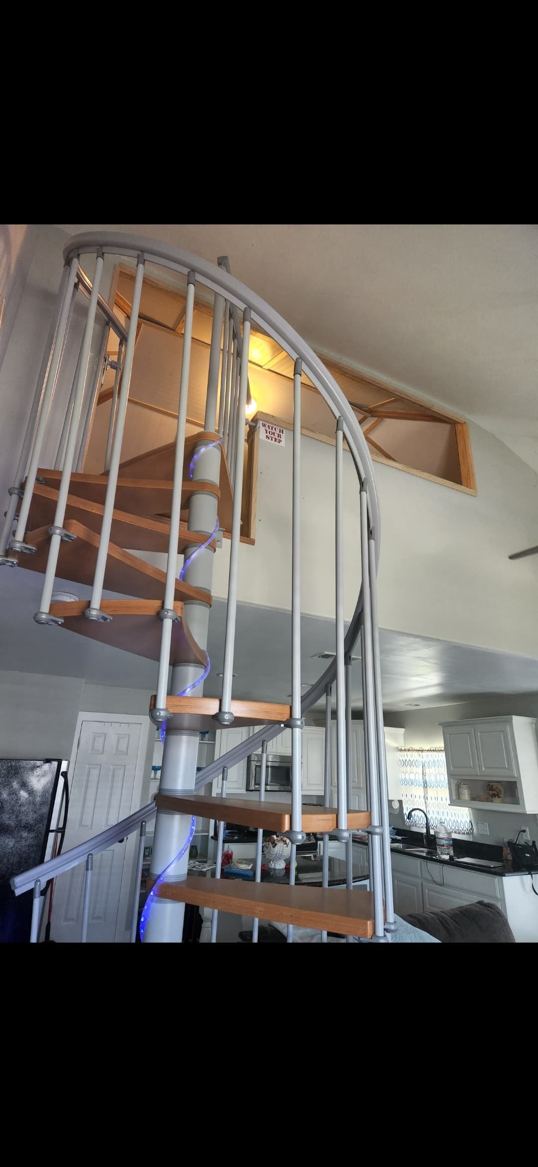 Stairs that lead up to loft bedroom