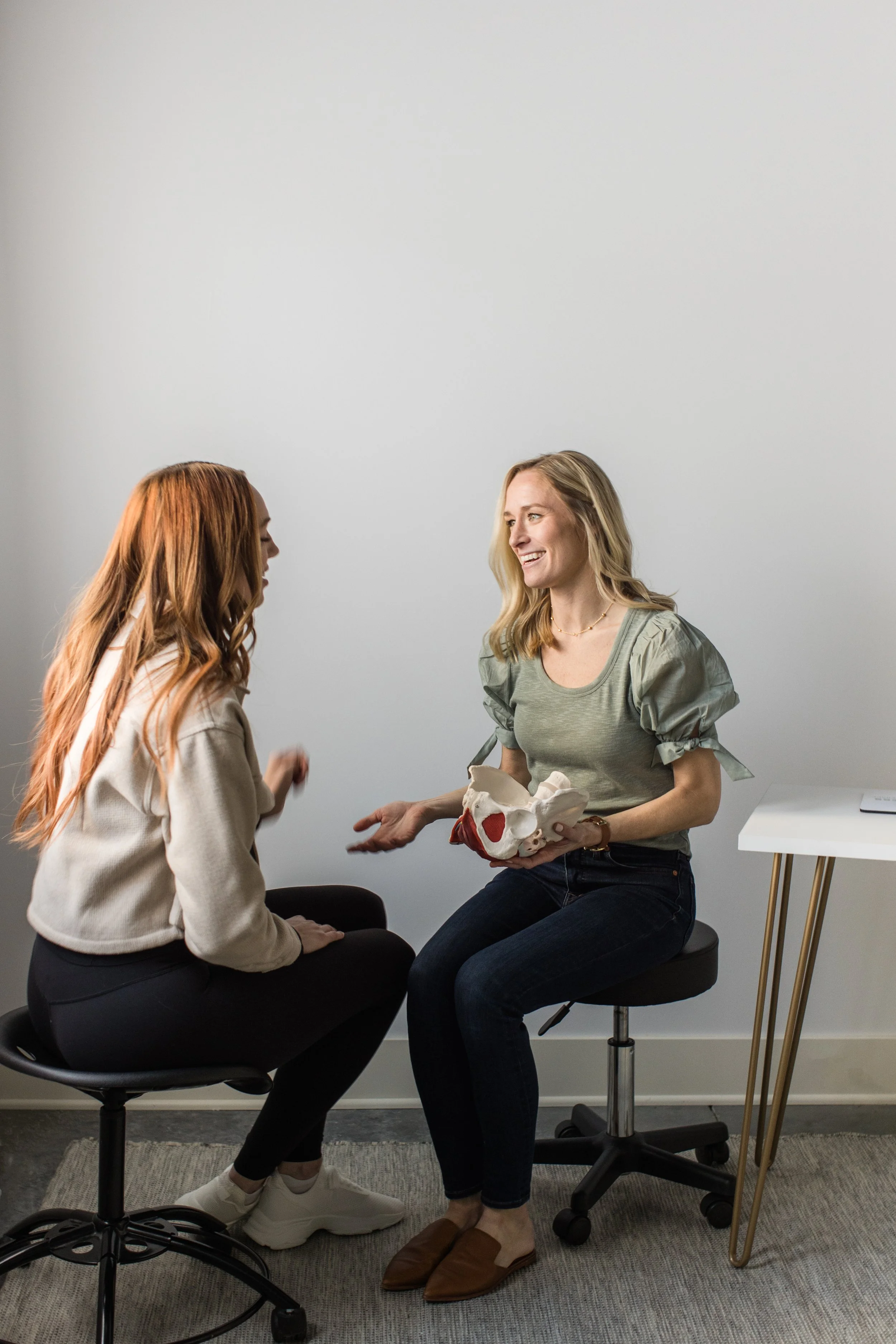 Prenatal physical therapy education session focused on pelvic floor and core during pregnancy
