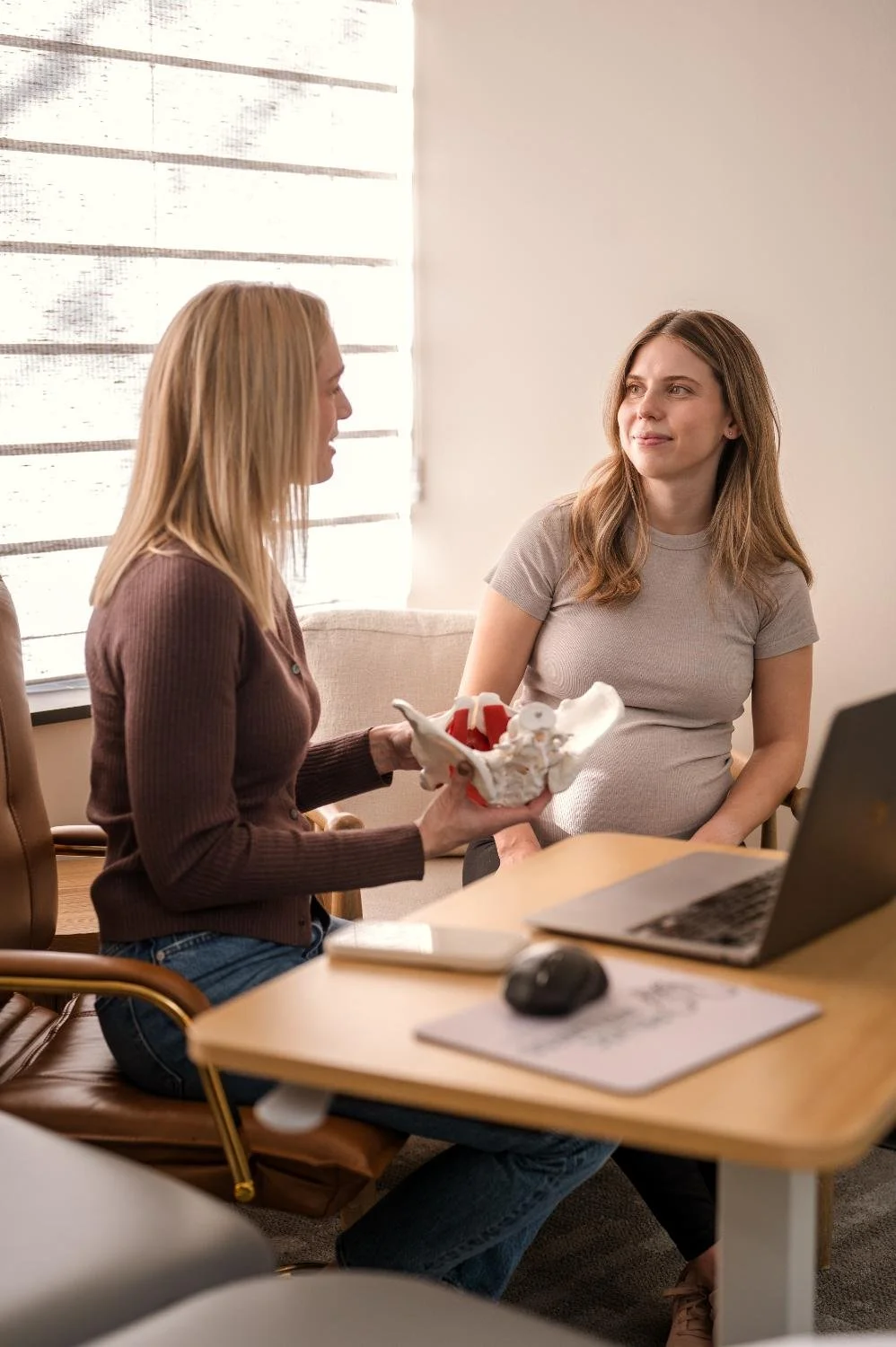 Pelvic health consultation at Pelvic Wellness Omaha discussing shockwave therapy and treatment options