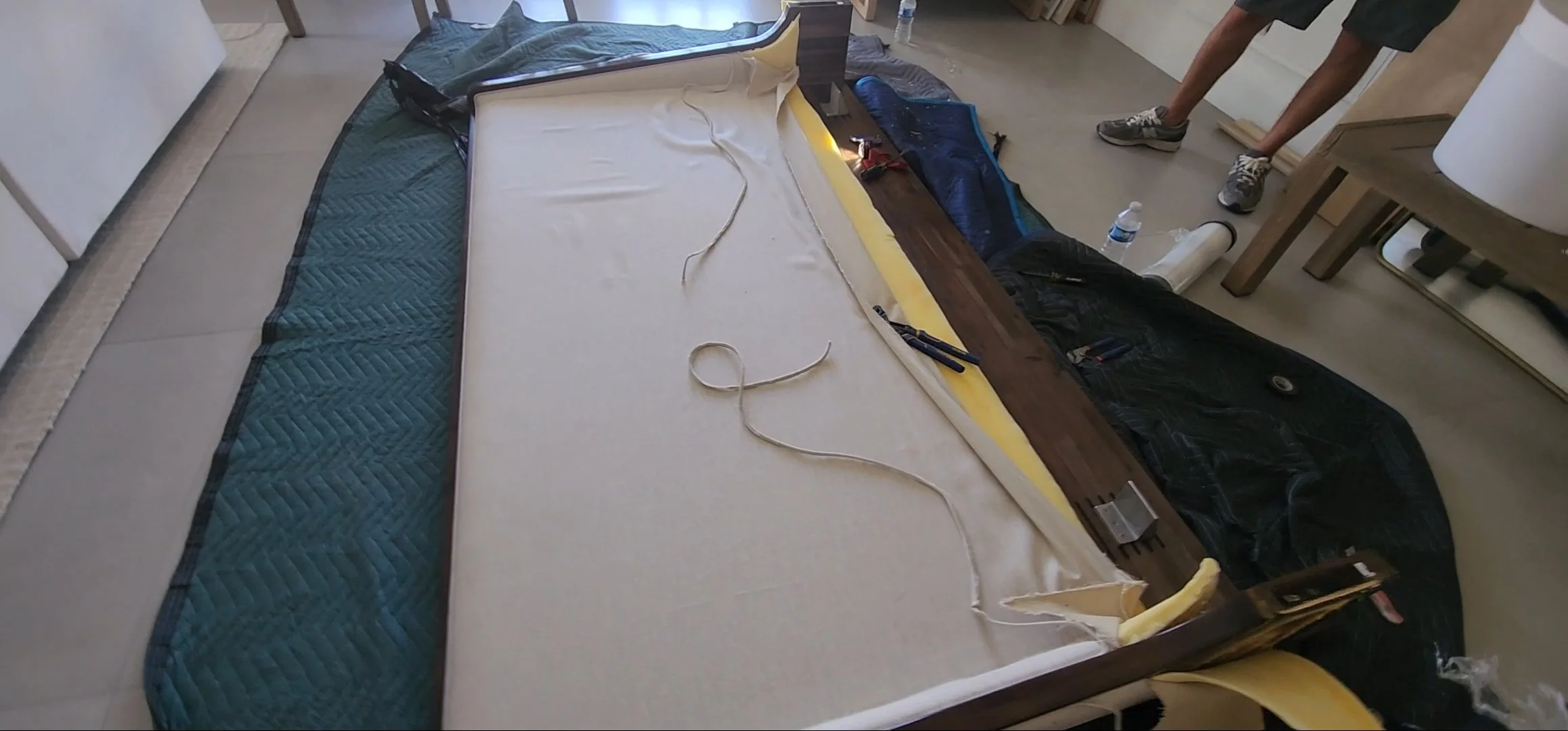 Luxury custom headboard installation inside a residential apartment