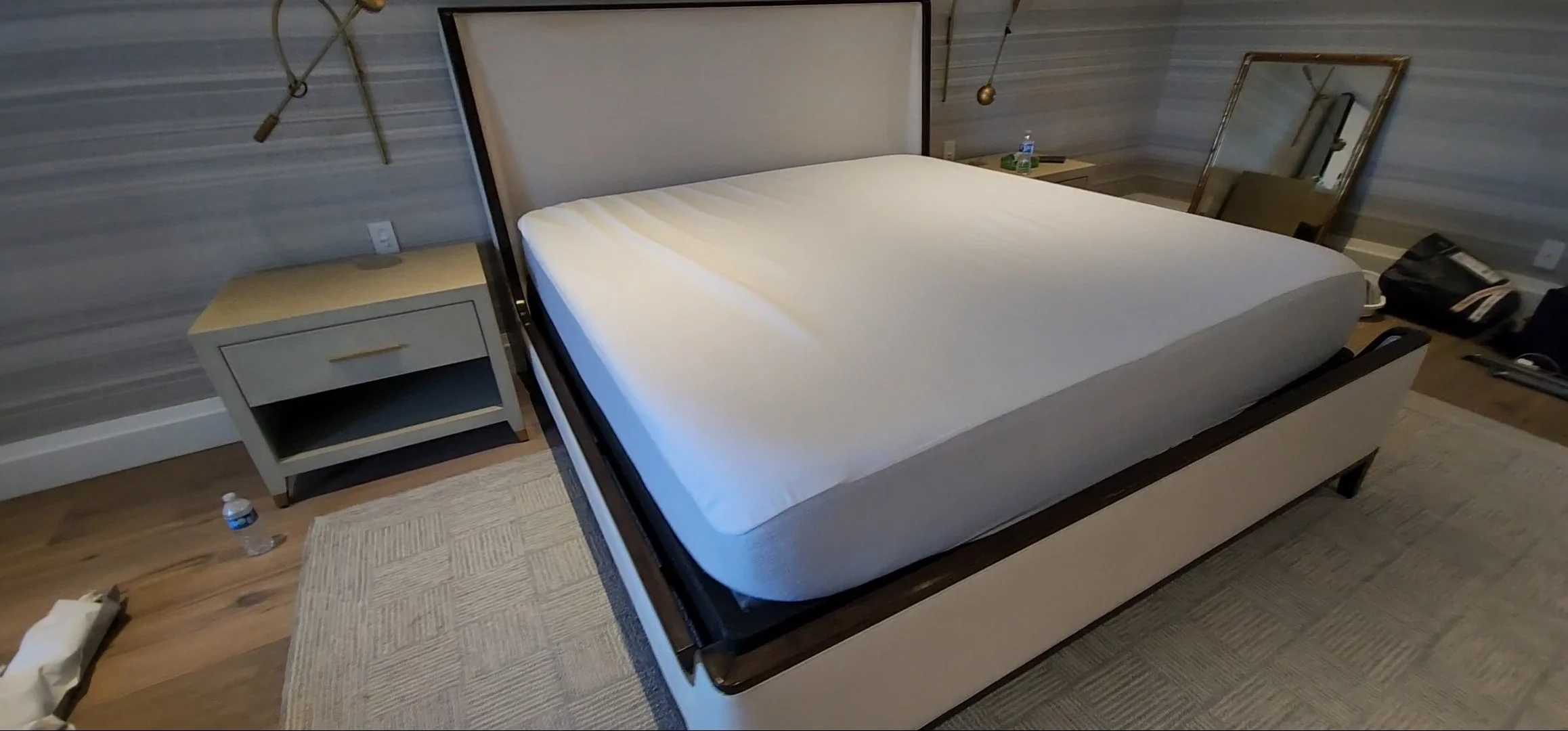 Large designer headboard assembled inside luxury residence