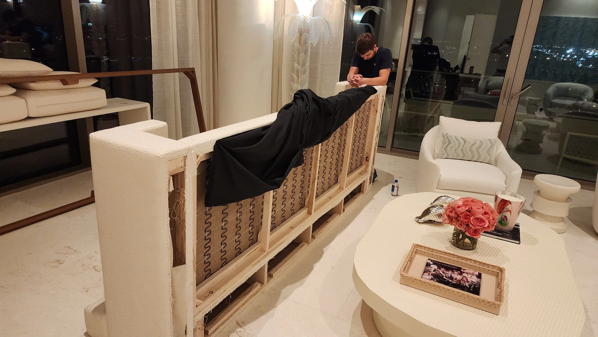 Oversized sofa disassembly service inside a Miami high-rise apartment