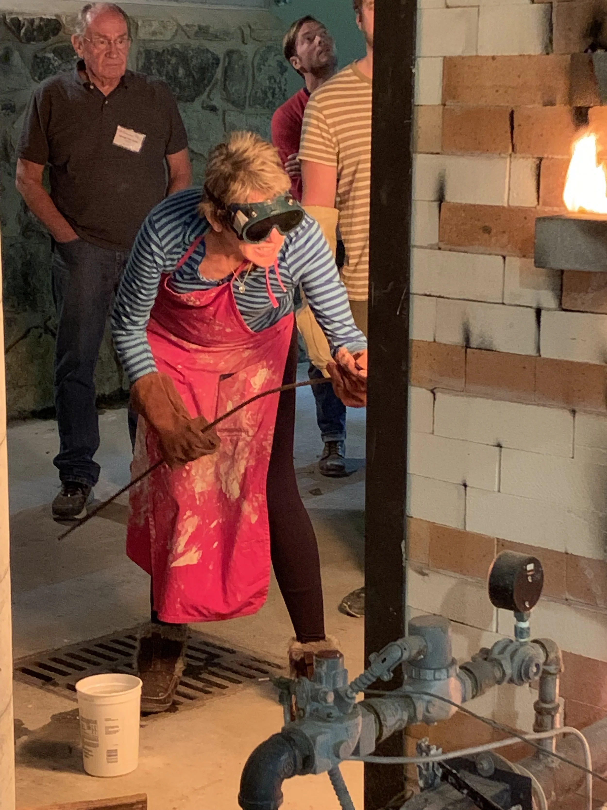 Removing a soda ring from Arrowmont kiln