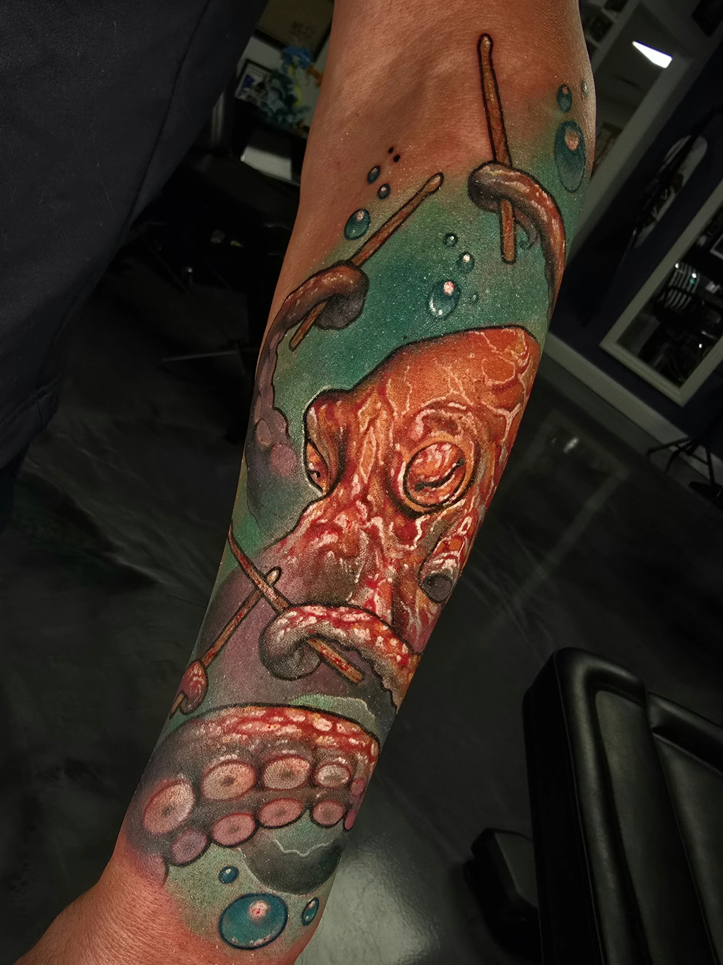 Realistic Orange Octopus Sleeve Tattoo