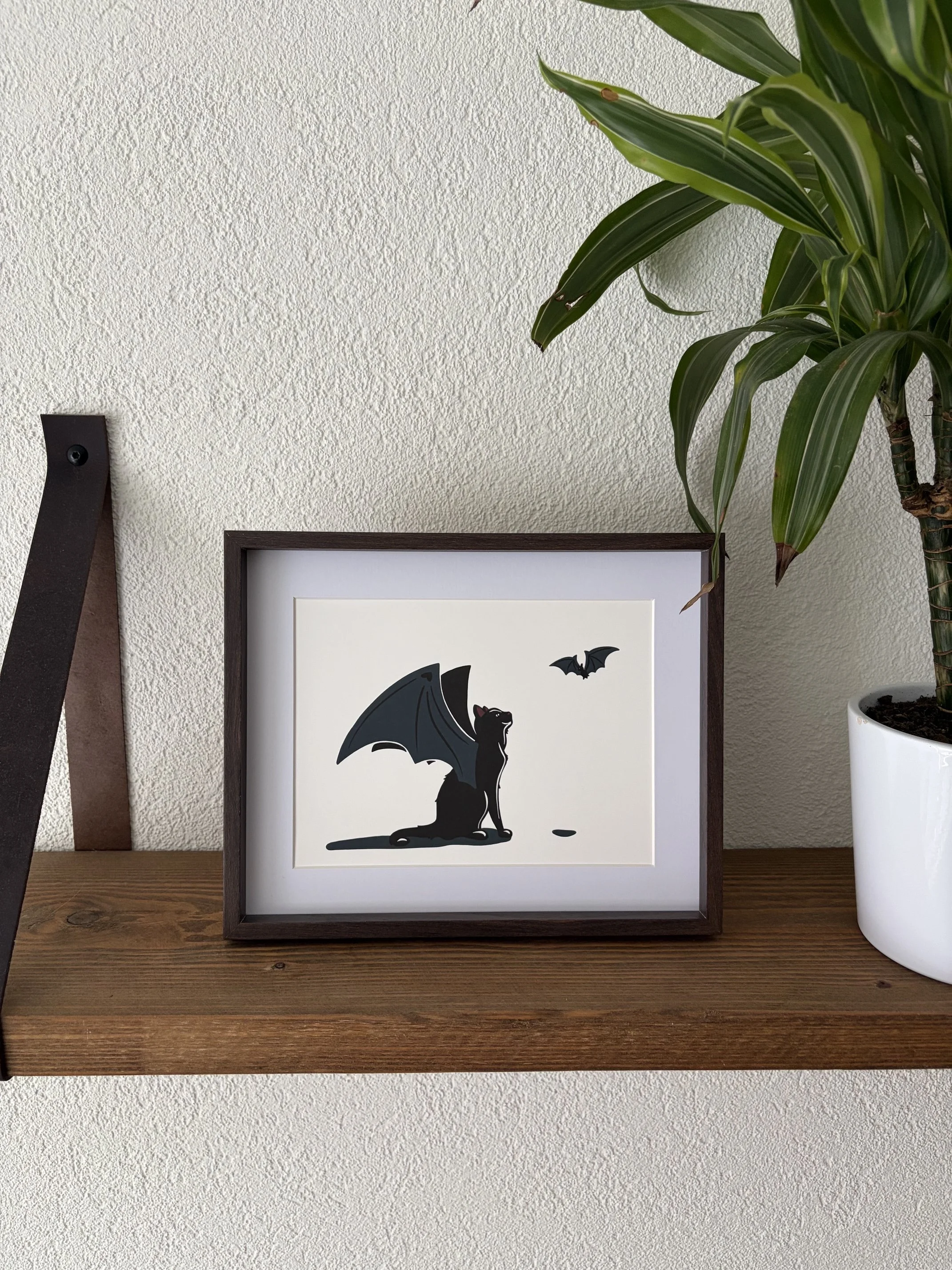 Cat with a bat