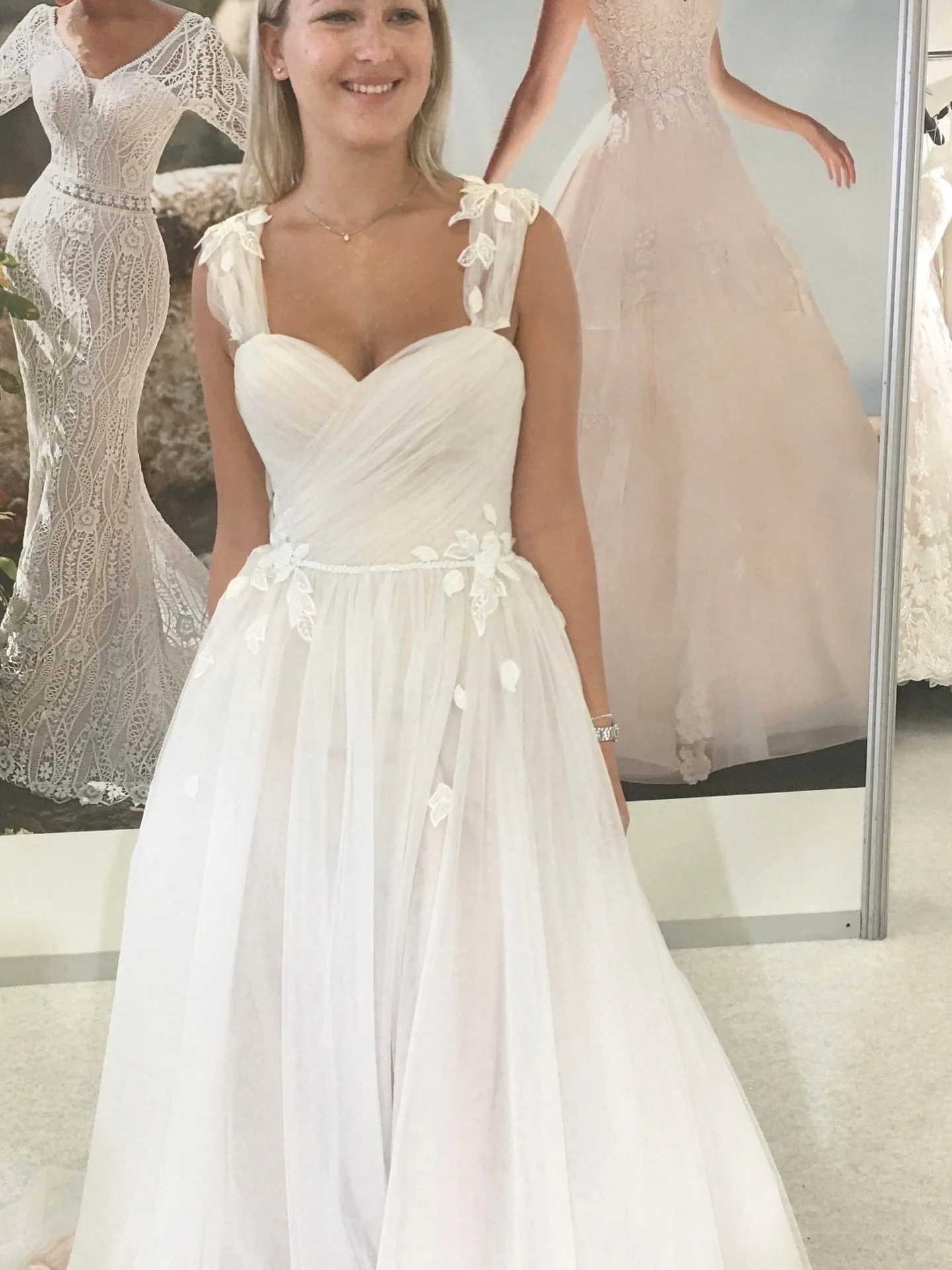Lots of beautiful dresses in store