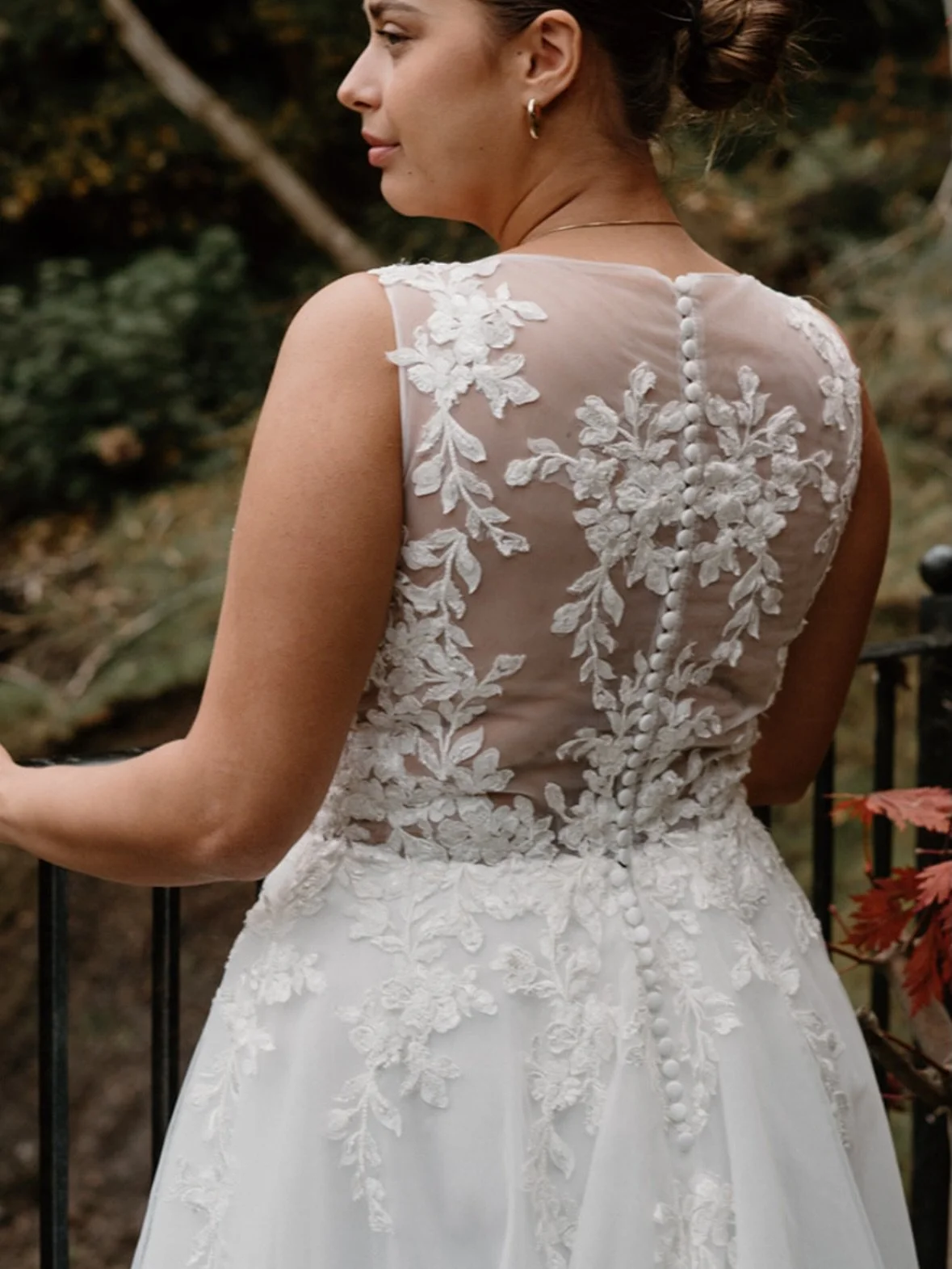 Romantic and light with beautiful floral lace the WD152 is sure to make a lasting impression with any bride. This ballgown is crafted from unique botanical lace with a plunge neckline. Delicate illusion straps with lace detailing create a soft impact