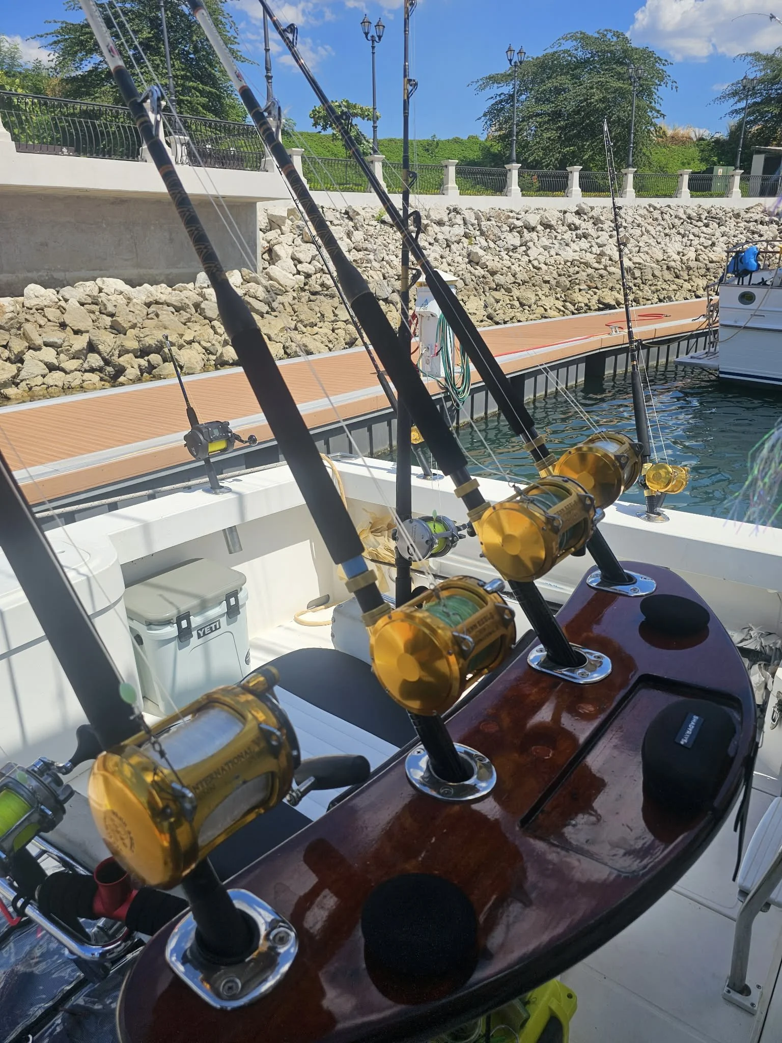 Fishing rods penn 50's ready to go on Fish Tale 2 near Marina Flamingo dock prepared for an offshore fishing charter in Costa Rica