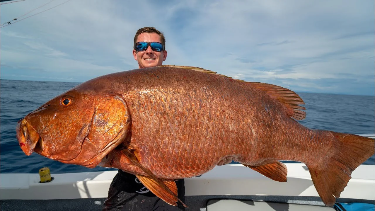 Guest holding a rare mexican red snapper caught aboard Fish Tale 2 fishing charter in Guanacaste Costa Rica