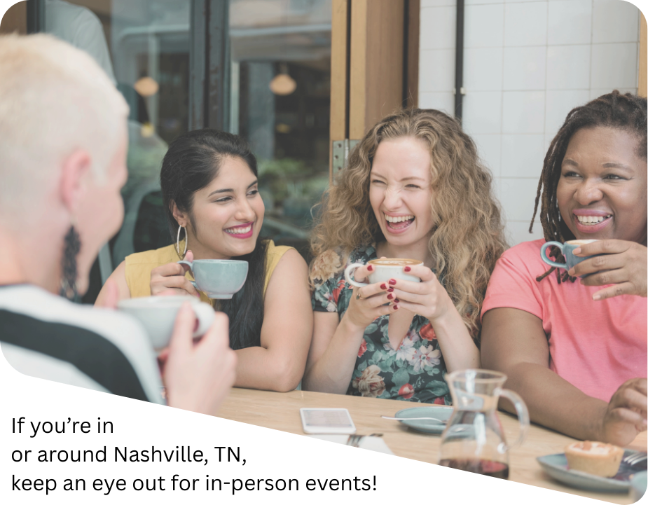 Women smiling and drinking coffee at a table together