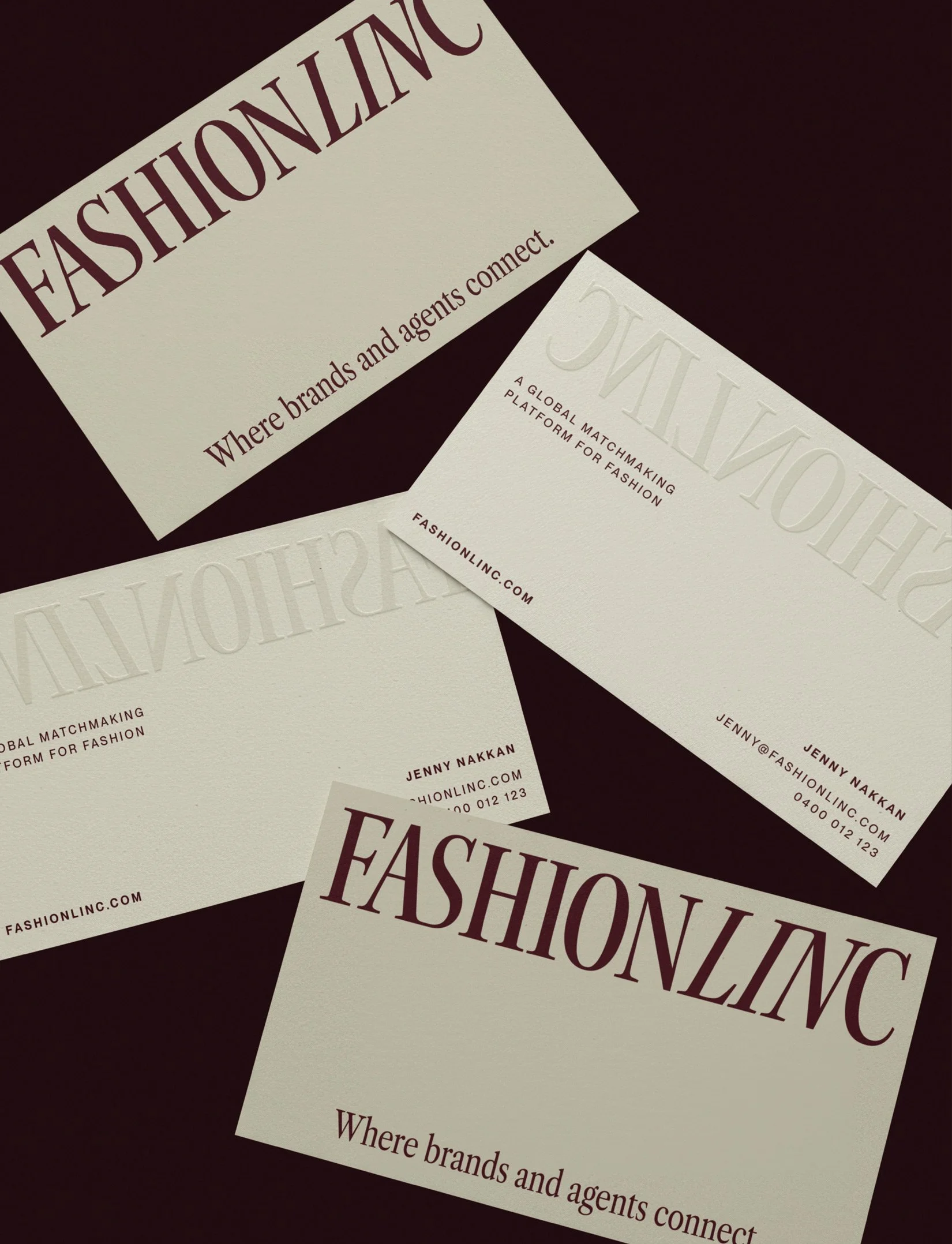Fashion brand business cards in burgundy and cream