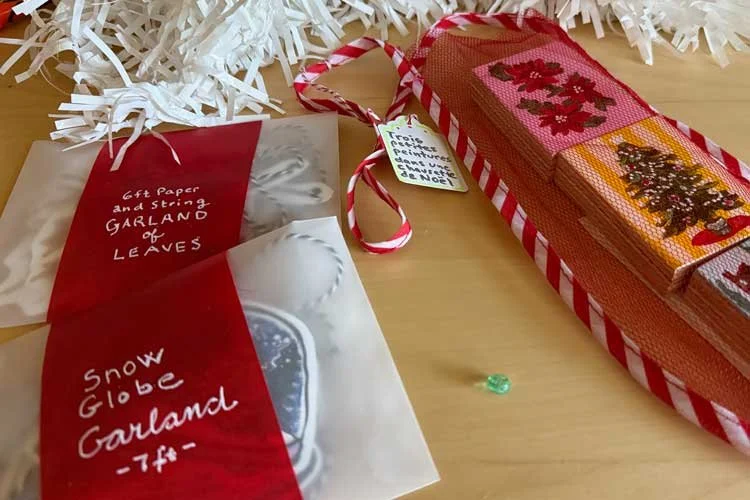 Paintings in a stocking &amp; packaged garlands
