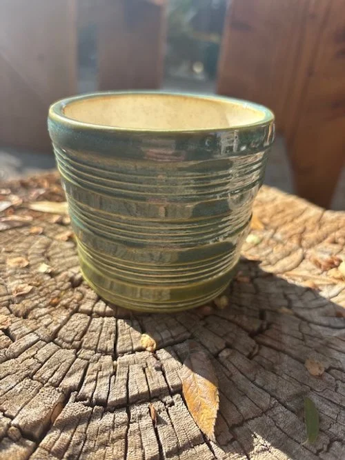 Small handleless cup