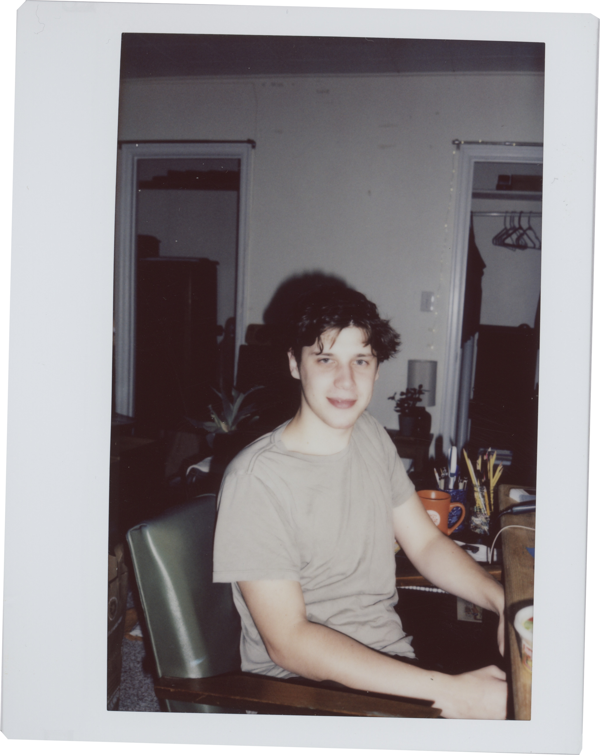Goobie at his desk.png